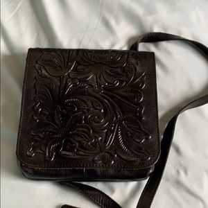 Mediterranean floral tooled leather purse